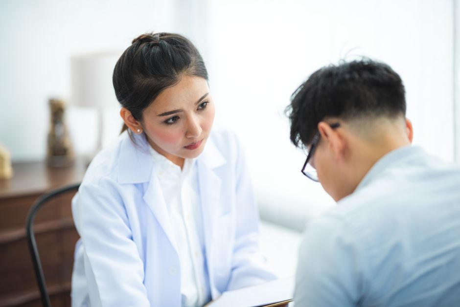International patient consulting a doctor before a colonoscopy screening in Korea