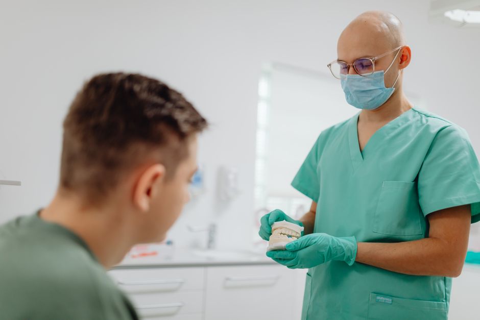 Dentist planning dental implants with a patient in Korea