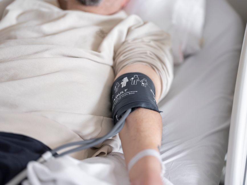 Patient resting in hospital room recovering after endoscopic procedure in Korea