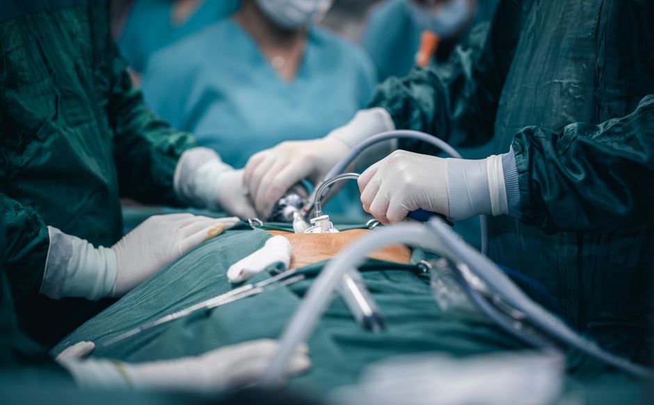 Surgical team performing endoscopic thyroidectomy in a South Korean operating room