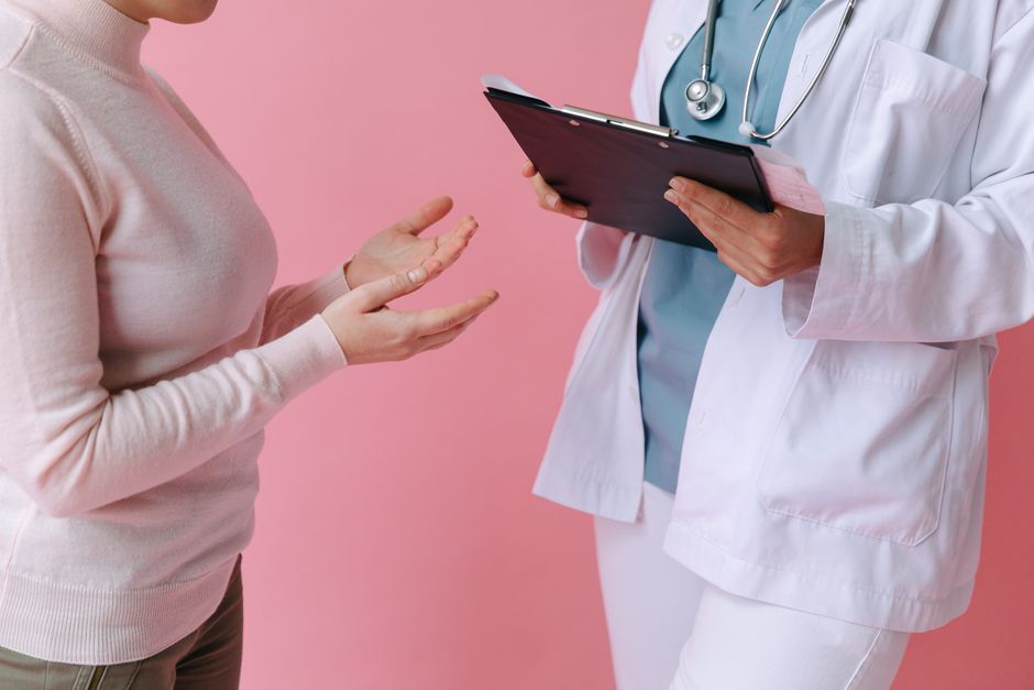 Fertility specialist reviewing test results with a patient during a consultation in South Korea
