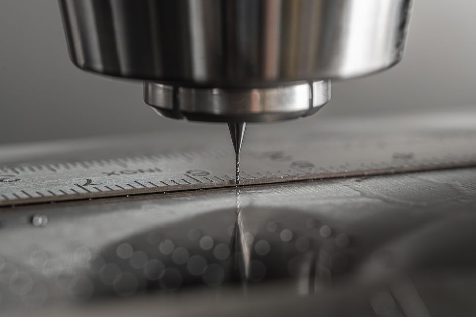 In-clinic CAD/CAM milling unit producing a zirconia dental crown from a digital scan file
