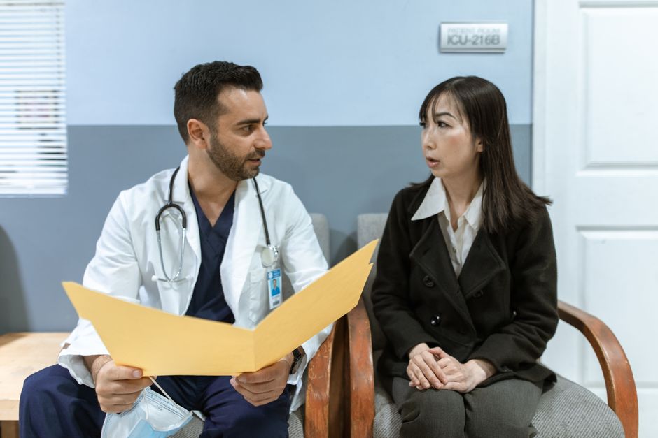 Bariatric surgeon consulting with patient before gastric bypass in Korea