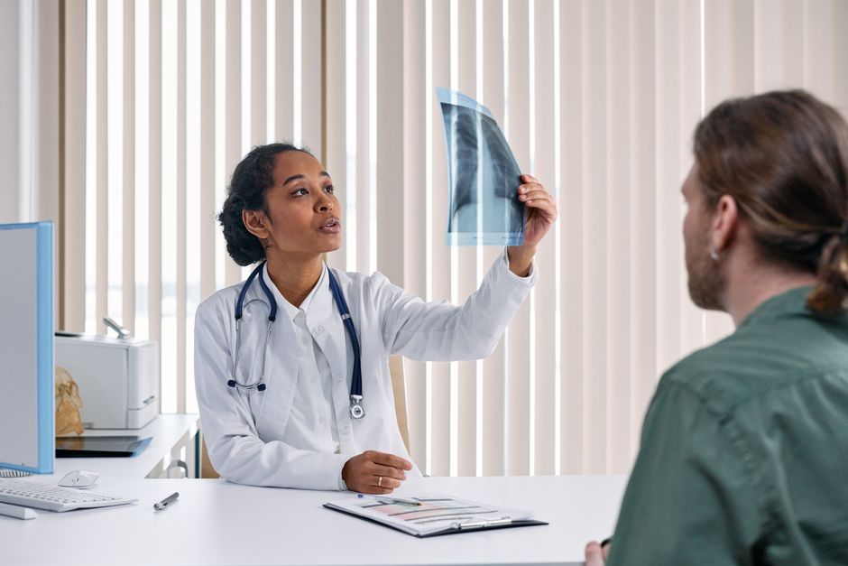 Doctor reviewing comprehensive health screening results with patient in Korea