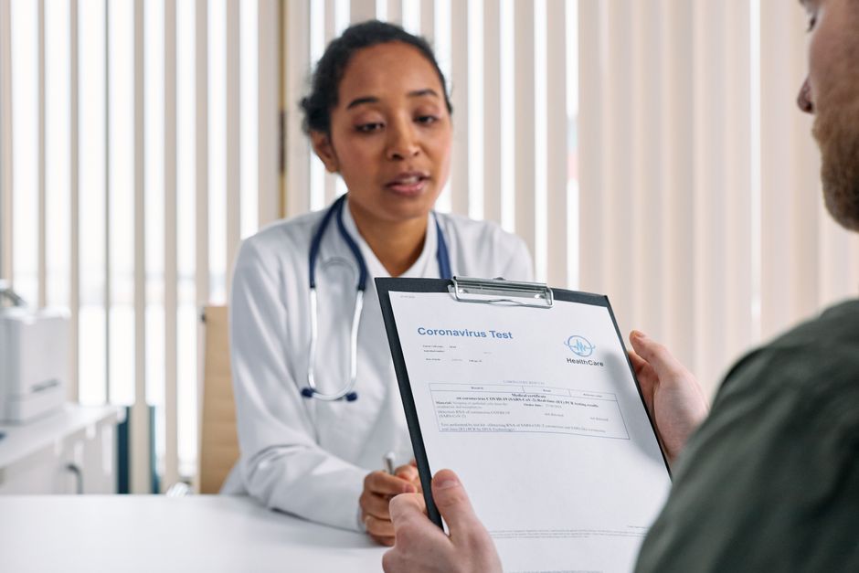 Patient and doctor discussing health screening results