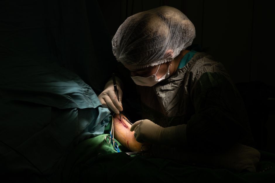 Surgical team performing a limb lengthening osteotomy procedure in a Korean hospital