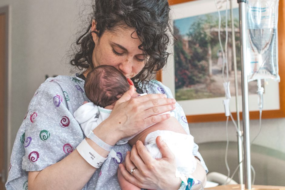 Family with newborn receiving post-NICU recovery care consultation at Korean hospital