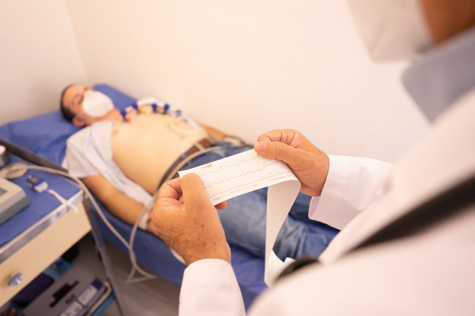 Patient recovering after coronary stent PCI procedure in Korean hospital cardiac ward