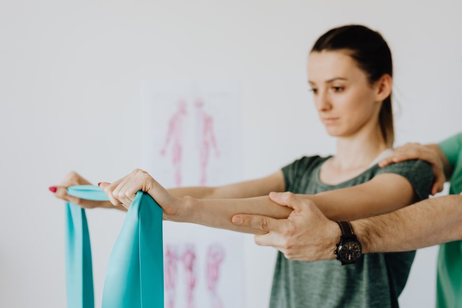 Physical therapist guiding a patient through rehabilitation exercises at a Korean hospital