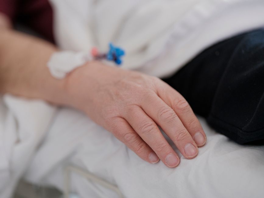 Patient resting comfortably in a clinic lounge after completing an SBRT session in South Korea