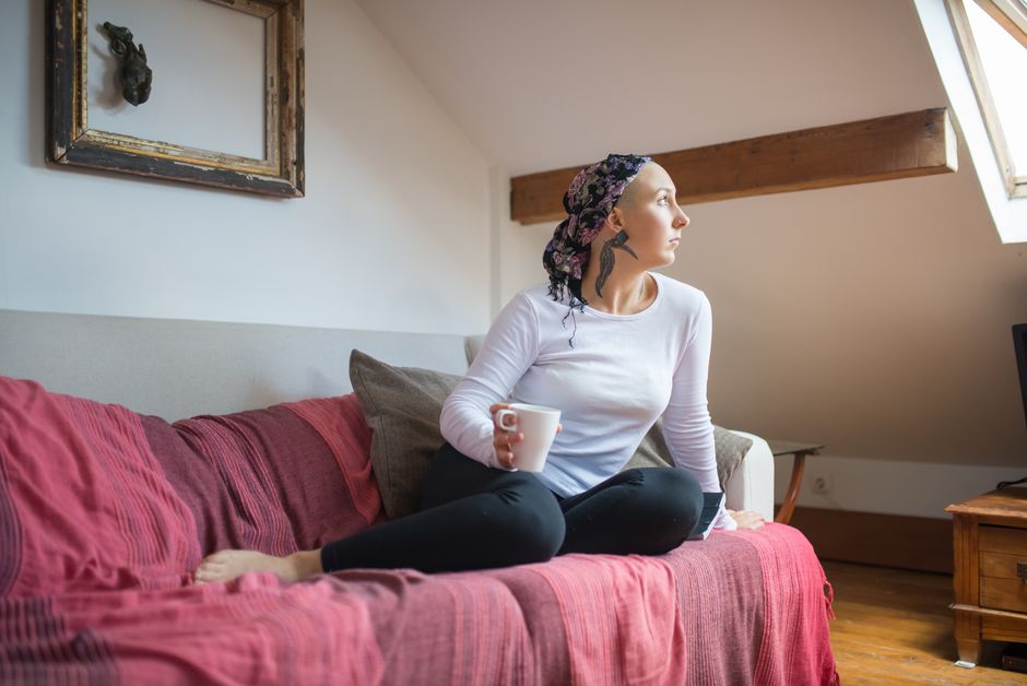 Patient resting and staying hydrated during tonsillectomy recovery after surgery in Korea